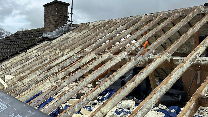 Roof structure exposed during spray foam removal