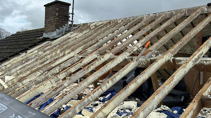 Roof structure exposed during spray foam removal